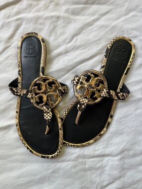 Tory Burch Black & Gold Logo Thong Sandals with Snake-Print Trim